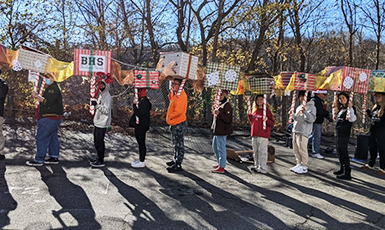  students marching with their float